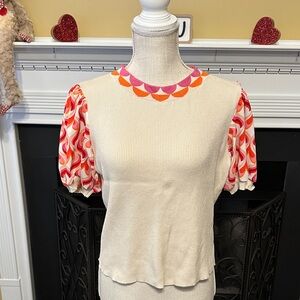 Elegant Cream Blouse with Vibrant Sleeves